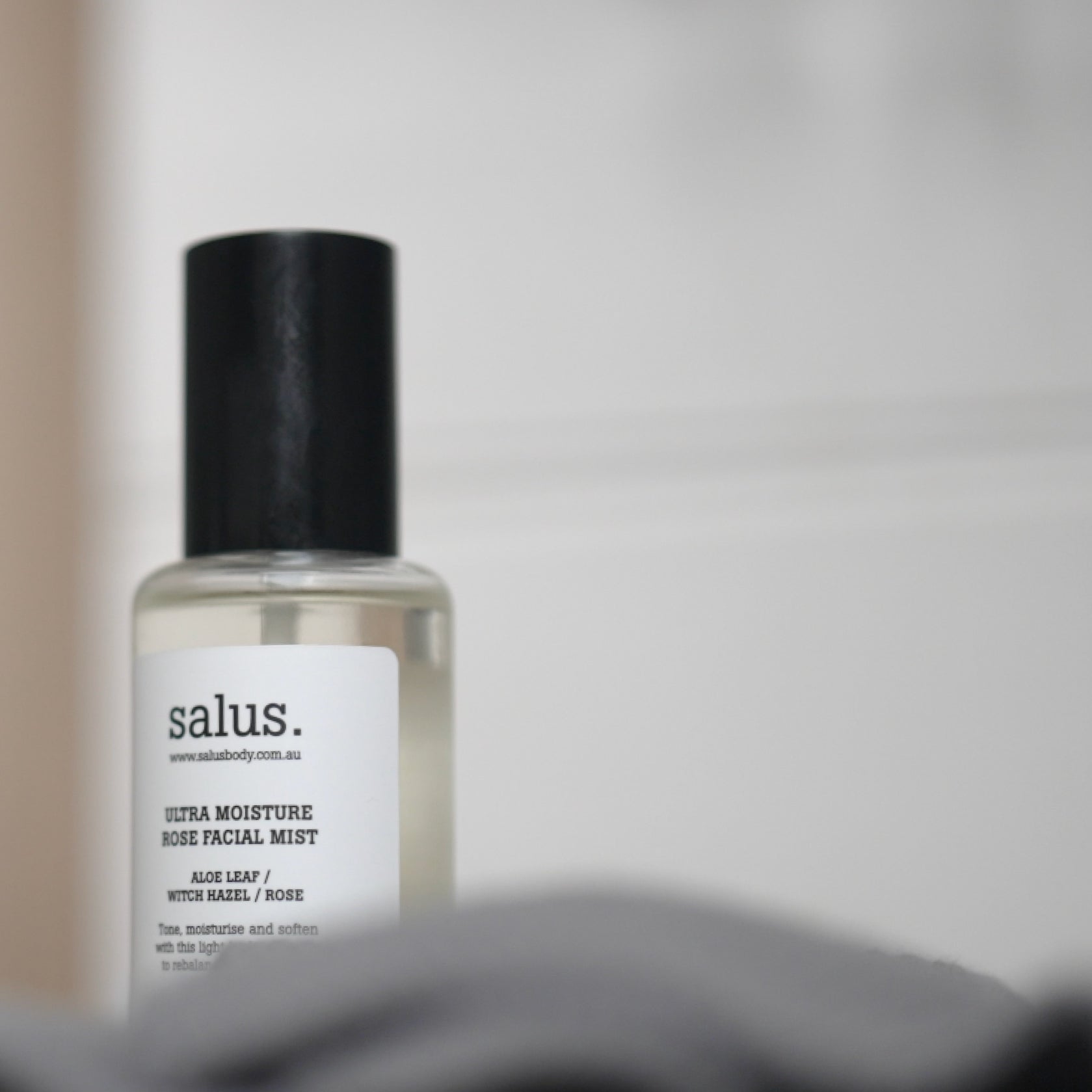 Salus Ultra Moisture Rose Facial Mist bottle with rose-themed design, 100ml size, for hydrating and refreshing skin.