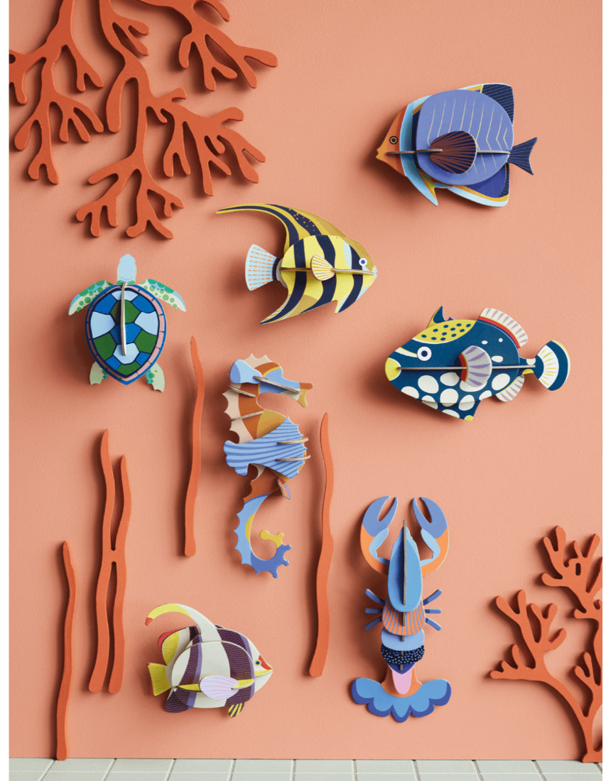 Studio Roof wall decor featuring a colorful lobster and various sea creatures in an artistic marine-themed illustration.