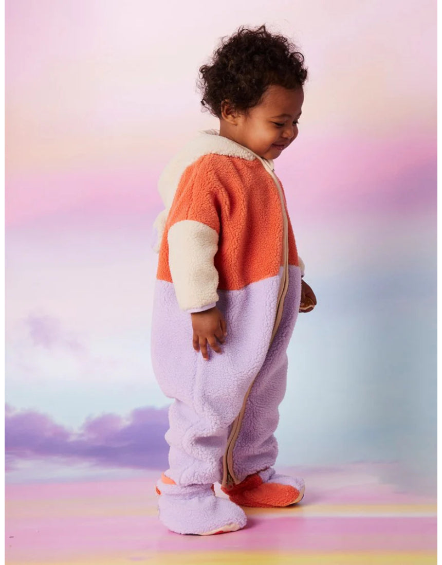 Lilac and coral sherpa booties for babies by Halcyon Nights, featuring soft, cozy fabric with cute, plush detailing.
