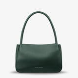 Green Status Anxiety Light Of Day handbag with front view, showcasing its stylish design and compact size.