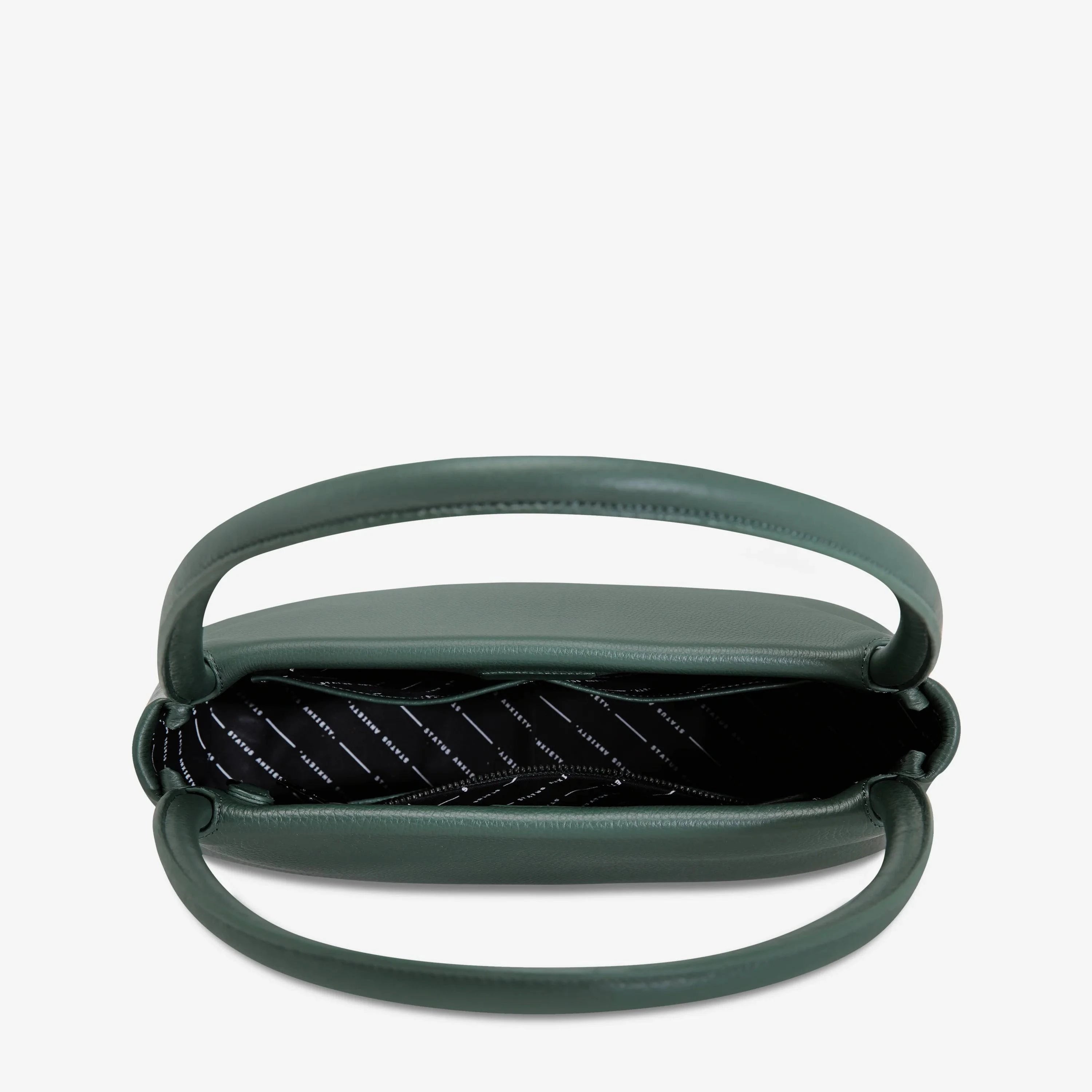 Open green Status Anxiety Light Of Day handbag showing interior and stylish design, perfect for everyday use.