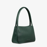 Green Status Anxiety Light Of Day handbag with sleek design and top handle, displayed from a side view.