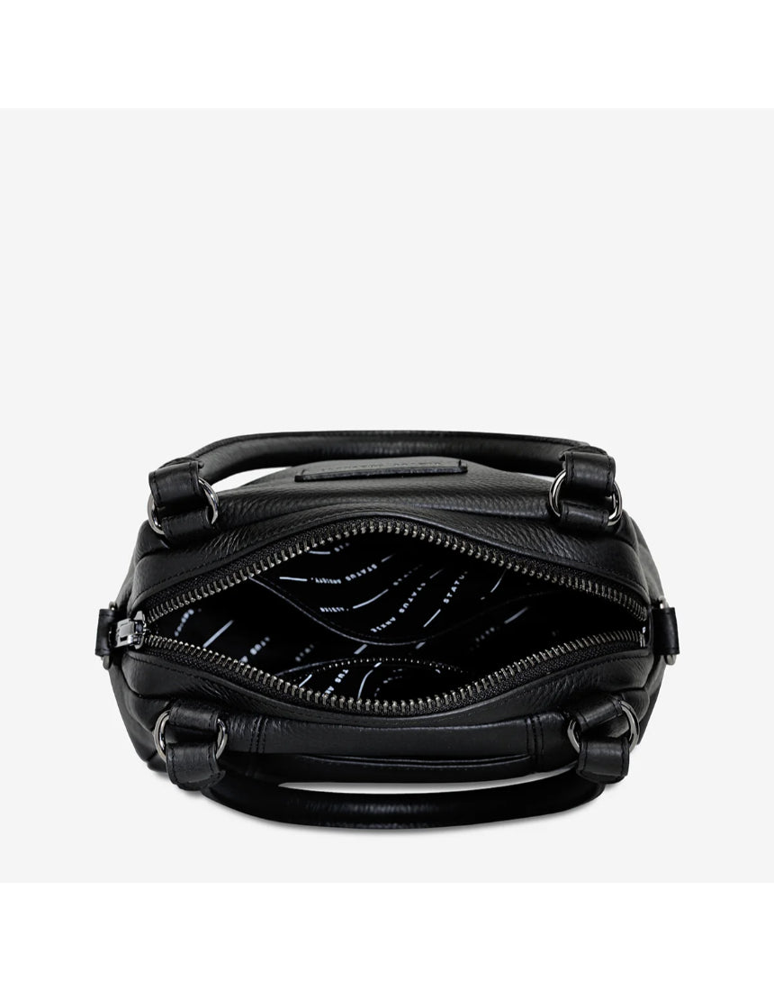 Black Status Anxiety Mini Mountains Bag open with zipper, stylish small bag for essentials with mountain-inspired design.