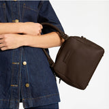 Status Anxiety Mini Mountains bag in cocoa color, stylish bags with a compact design, perfect for everyday use.