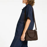 Status Anxiety Mini Mountains Bag in cocoa color, stylish small bag with adjustable strap, ideal for casual outings.