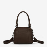 Status Anxiety Mini Mountains Bag in cocoa color, stylish bag with mountain-inspired design and adjustable strap, front and back views.