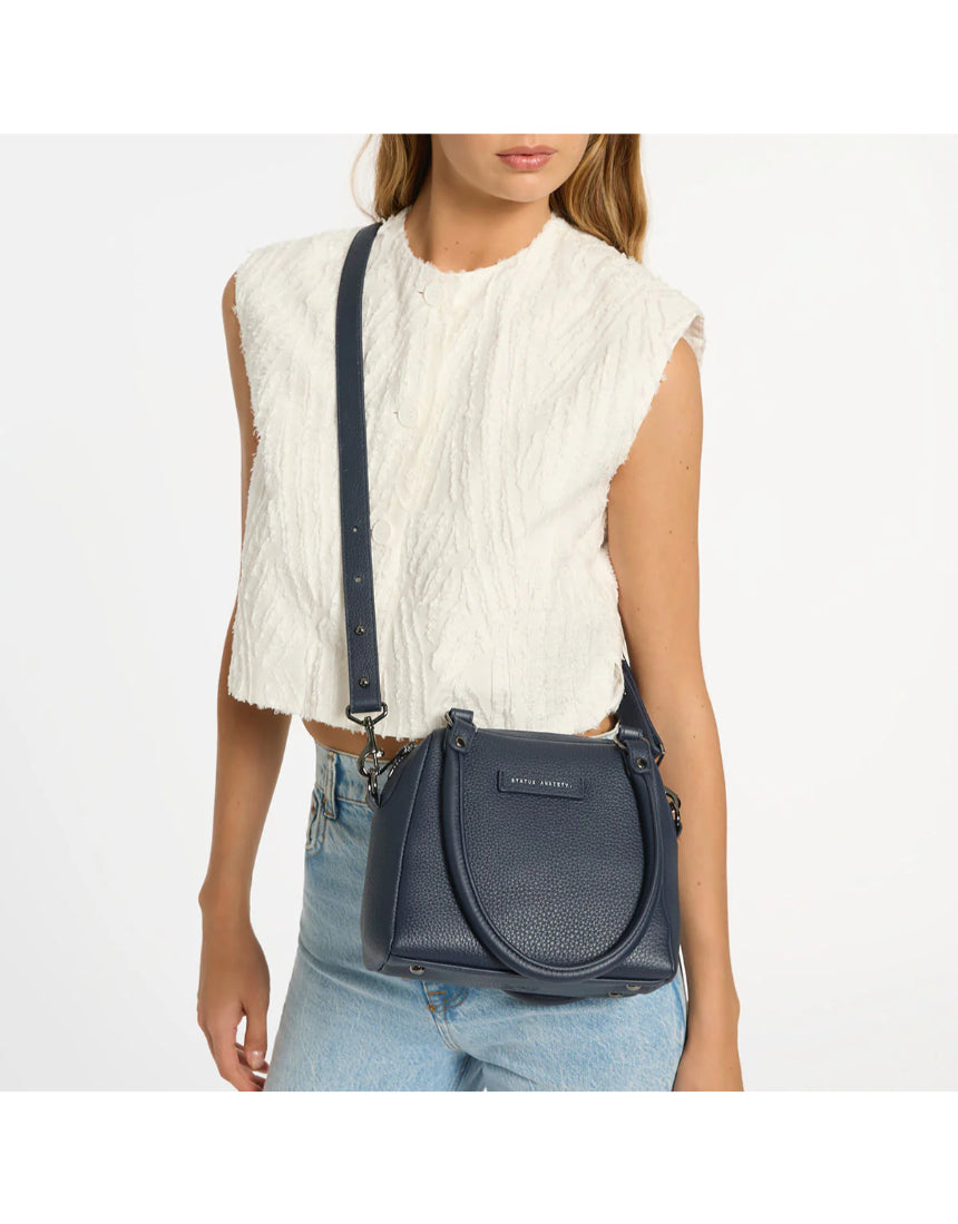 Mini Mountains Bag by Status Anxiety, midnight blue leather bag with sleek design, perfect for casual and everyday use.