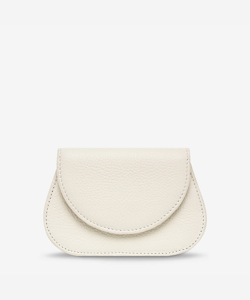 Status Anxiety Eyes Wide Chalk handbag with stylish design, featuring a sleek chalk-colored exterior and modern aesthetic.