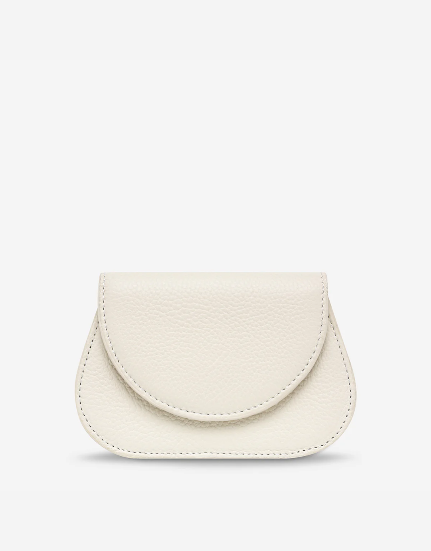Status Anxiety Eyes Wide Chalk handbag with stylish design, featuring a sleek chalk-colored exterior and modern aesthetic.