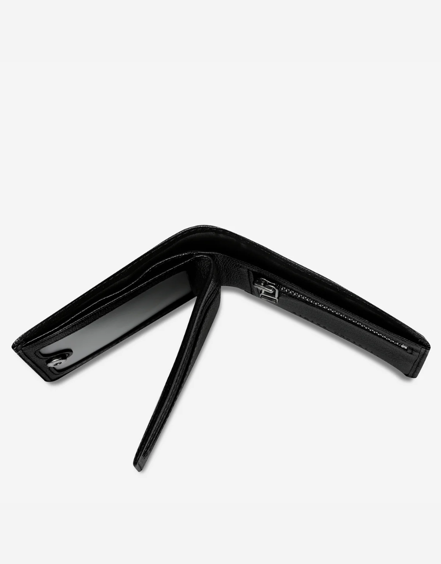 Black Status Anxiety Leonard Wallet with sleek leather design, featuring multiple card slots and a compact, stylish look.