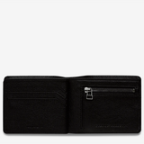 Black Status Anxiety Leonard Wallet showing multiple card slots and a sleek design, made from durable leather.