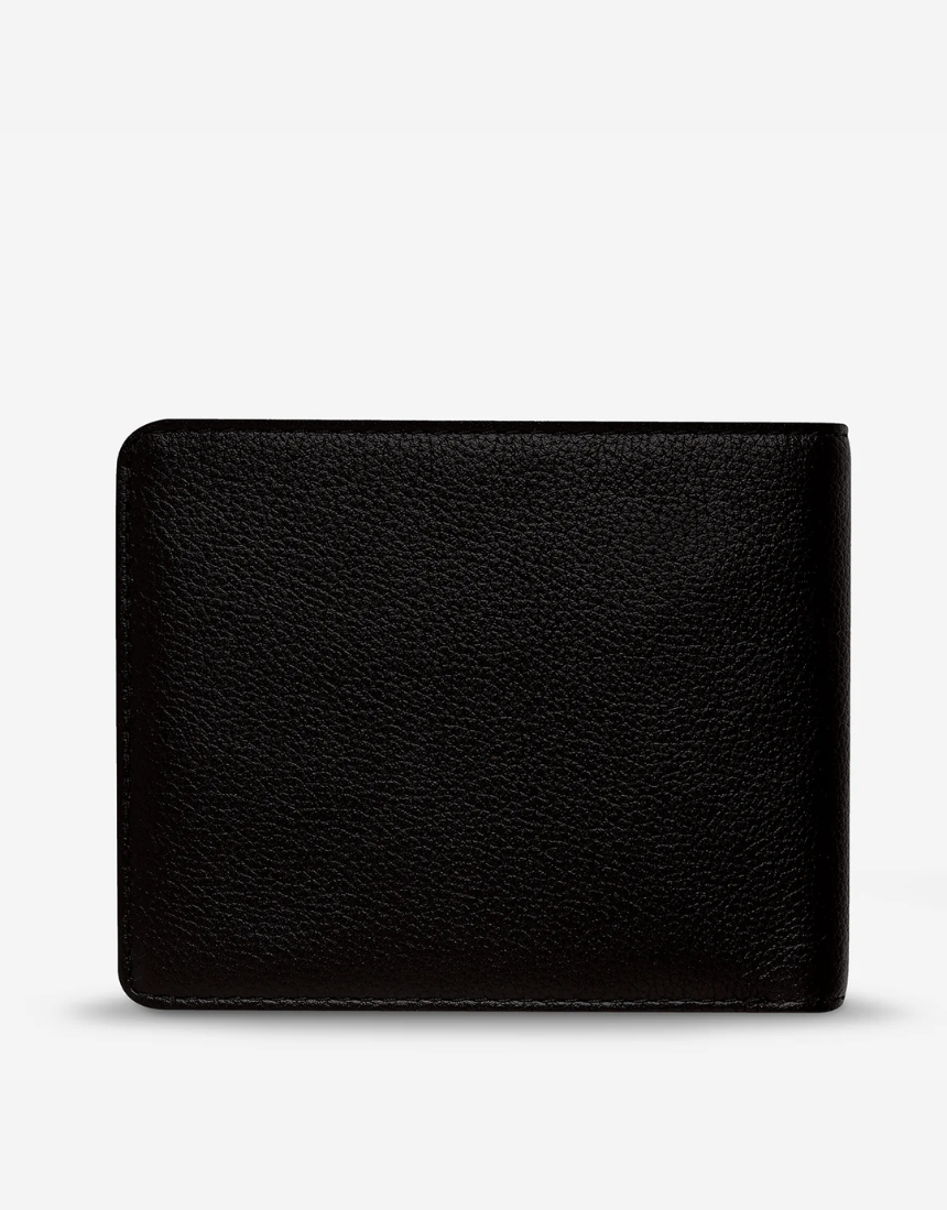 Black Leonard Wallet by Status Anxiety, stylish leather wallet with multiple card slots and a sleek design.
