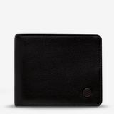 Black Leonard Wallet by Status Anxiety, a sleek leather wallet with multiple card slots and a minimalist design.