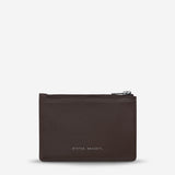 Status Anxiety Gone Again Wallet in Cocoa Nappa leather displayed front view showing smooth texture and compact design.
