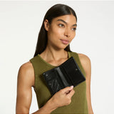 Black Status Anxiety Is Now Better Wallet with multiple card slots and sleek design, ideal for everyday use.