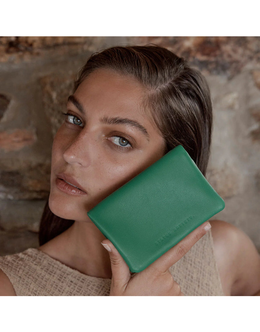 Emerald Status Anxiety Is Now Better Wallet showing multiple card slots and sleek design for everyday use