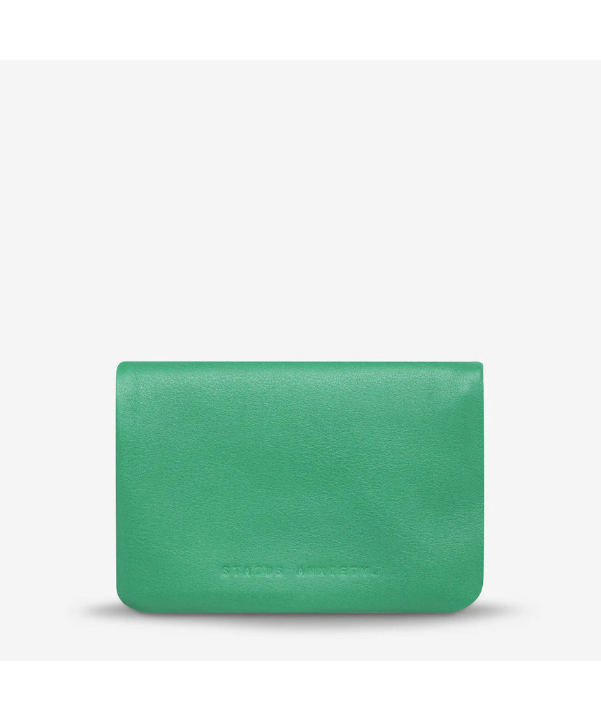 Status Anxiety Is Now Better Wallet in emerald with smooth front, featuring a sleek, modern design for everyday use.