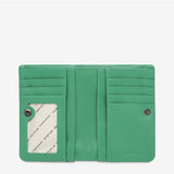 Open Status Anxiety Is Now Better Wallet in emerald with smooth leather finish, showing multiple card slots and organization features.