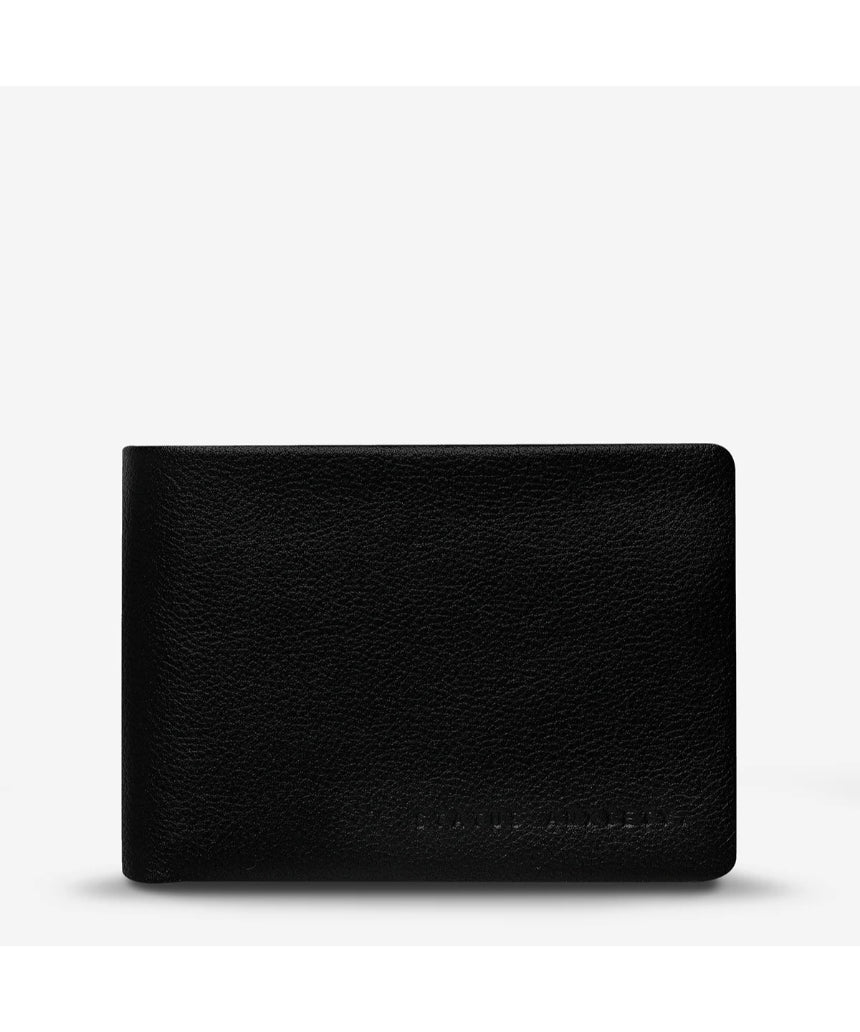 Black Status Anxiety Jonah Wallet with front view, showcasing its sleek design and compact wallet features.