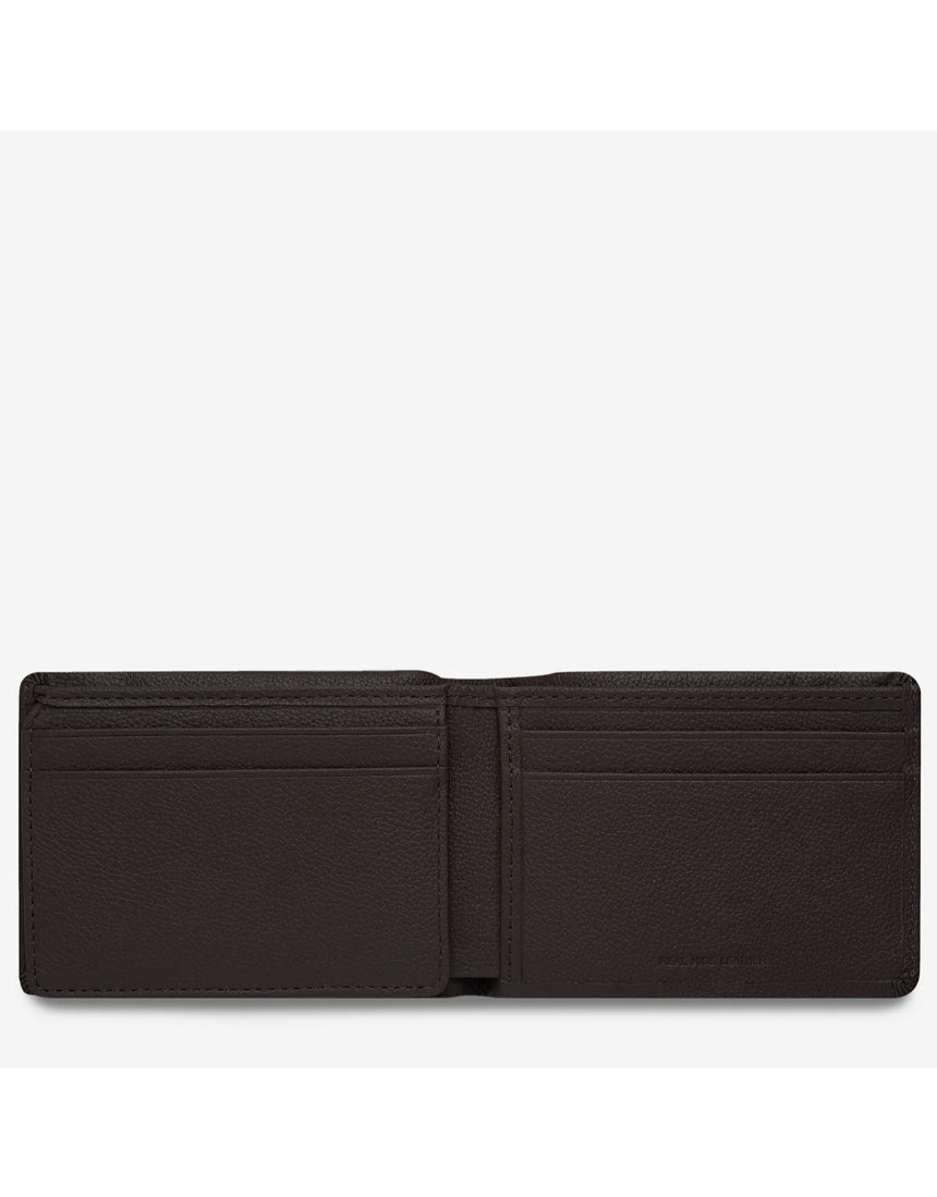 Status Anxiety Jonah Wallet in chocolate leather, compact and stylish men's wallet with multiple card slots and a sleek design.