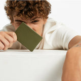 Khaki Status Anxiety Jonah Wallet with multiple card slots and sleek design, made from durable leather.
