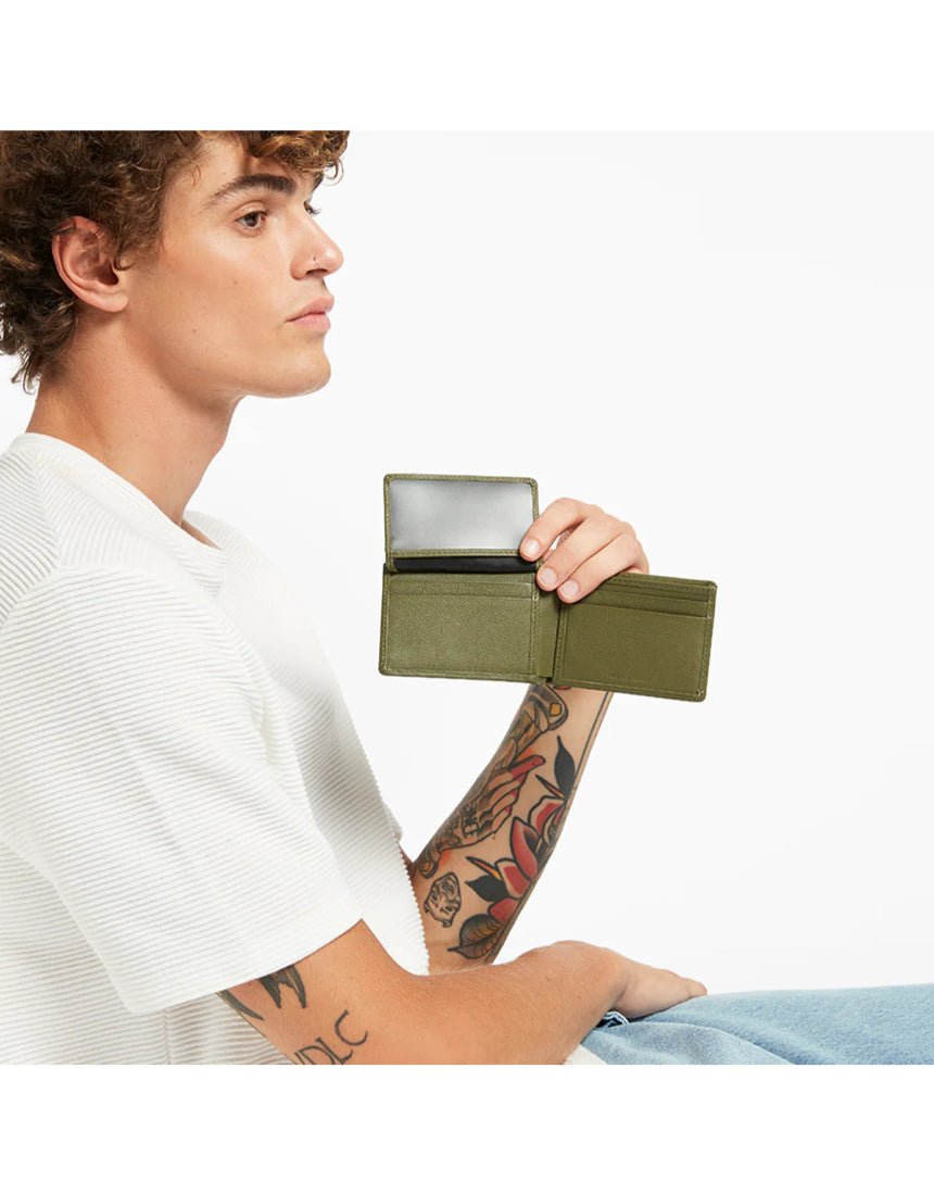 Khaki Status Anxiety Jonah Wallet with multiple card slots and compact design, featuring the brand's signature style.