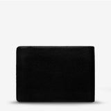 Status Anxiety Otis Wallet in black showing front view with card slots and sleek leather design.