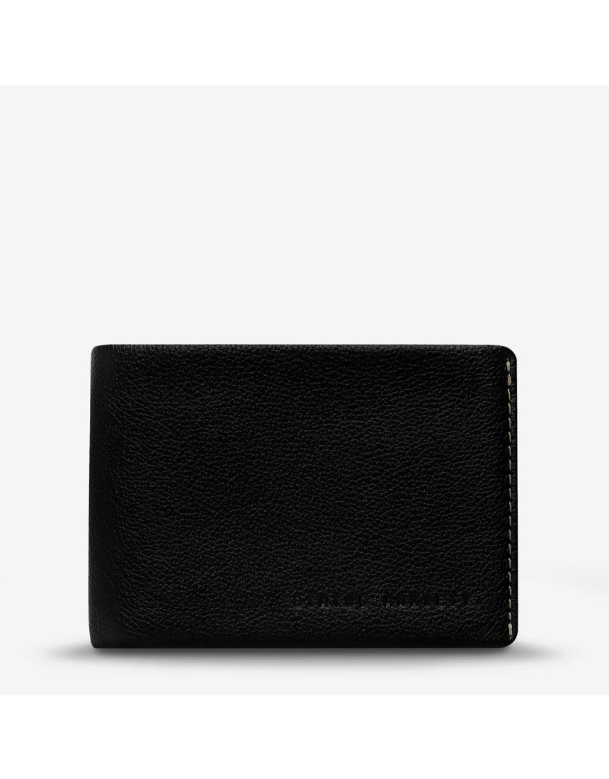 Black Status Anxiety Otis Wallet with multiple card slots and compact design, shown from the front view.