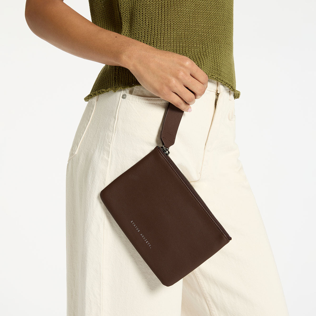 Status Anxiety Take Your Chances Wallet in Cocoa Nappa leather, showcasing its sleek design and card slots.