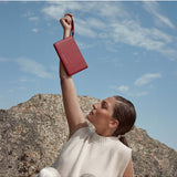 Status Anxiety Take Your Chances Wallet in rouge, featuring multiple card slots and a sleek design for everyday use.