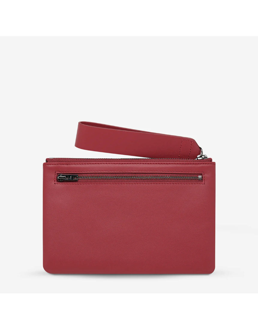 Status Anxiety Take Your Chances Wallet in rouge with a smooth back, stylish leather wallet designed for everyday use.