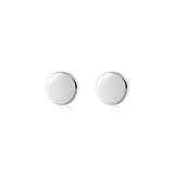 Sterling silver disc stud earrings by Linda Tahija featuring minimalist round design and polished finish.