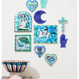 Jones & Co Fable Snake Blue Heart wall decor, a decorative art piece featuring a blue heart and snake design for interior styling.