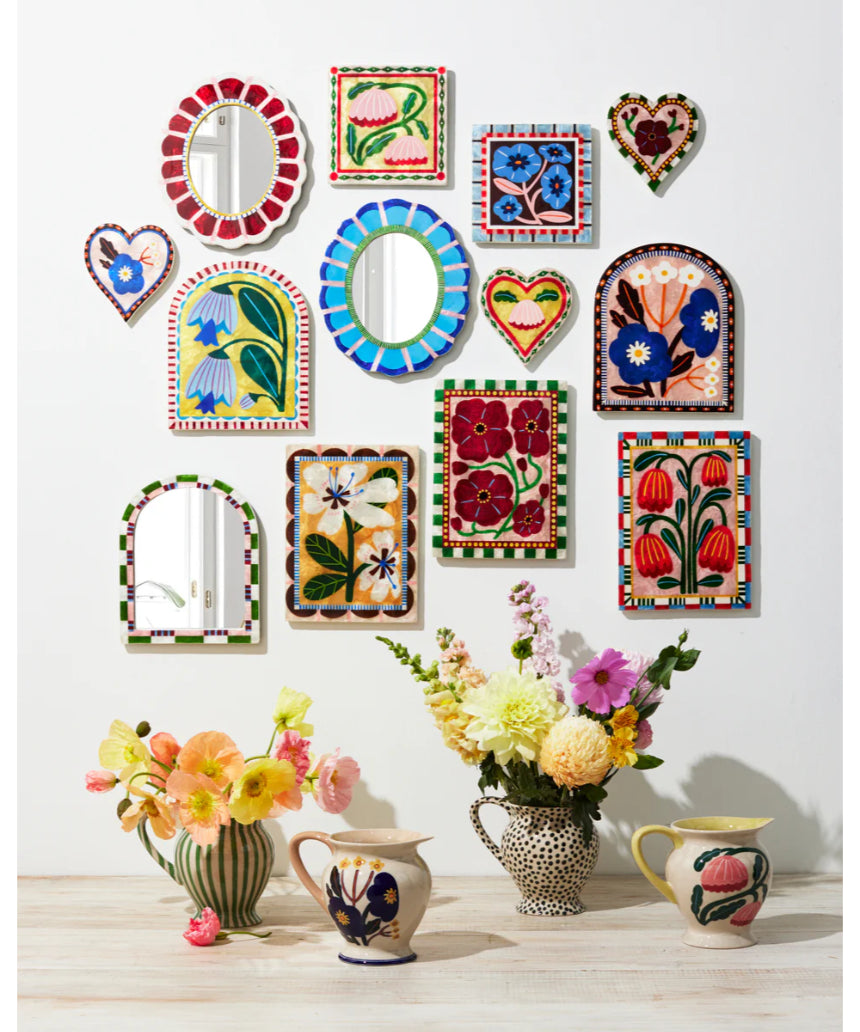 Jones & Co Bloom Nouveau Blue Heart wall decor featuring a stylish blue heart design on a textured background.