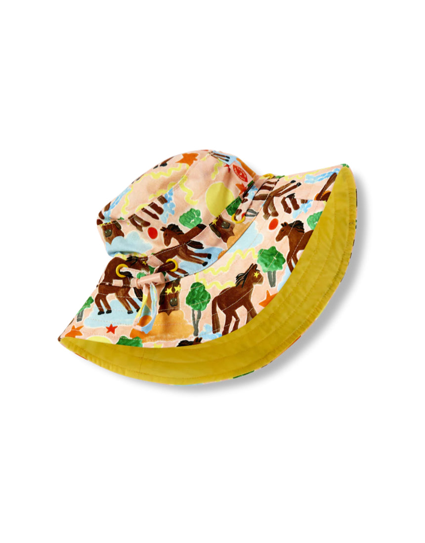 Say It Sister Giddy Up kids sun hat with wide brim and playful cow print design for sun protection and fun outdoor wear.