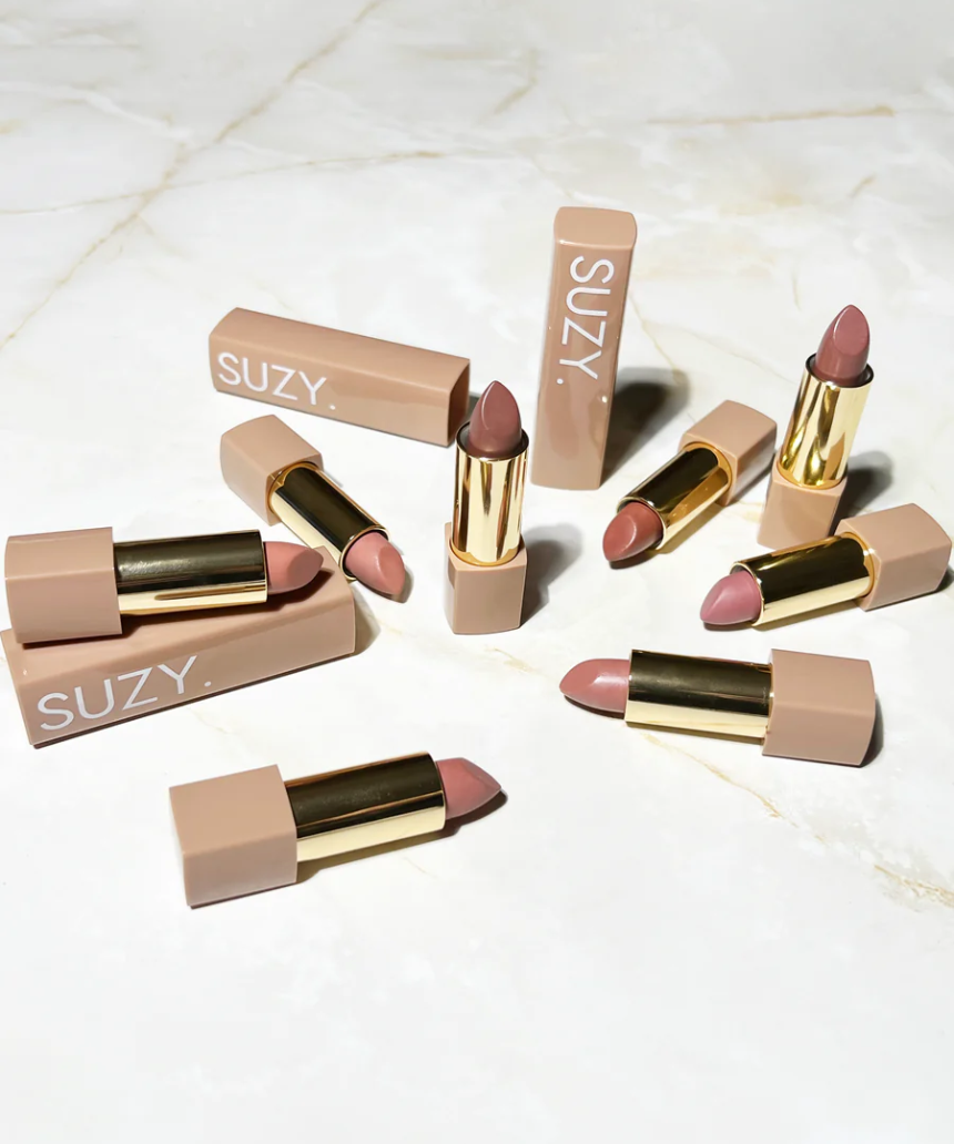 Suzy Lipsticks Honey Satin Luxe lipstick, creamy beige shade, with smooth satin finish, in elegant packaging.