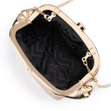 Olga Berg Tally metallic gold clutch bag with a sleek, shiny finish and elegant clasp closure.