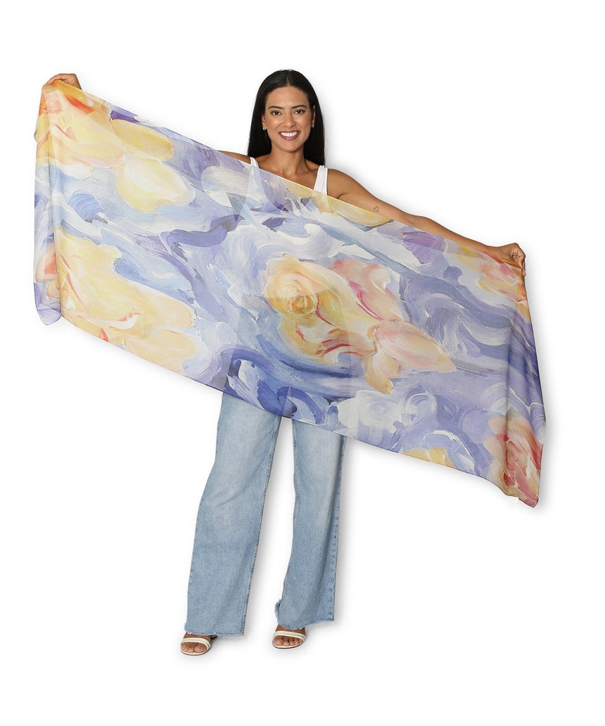The Artists Label A Sea of Roses scarf featuring a vibrant floral pattern in soft pastel tones, displayed flat.