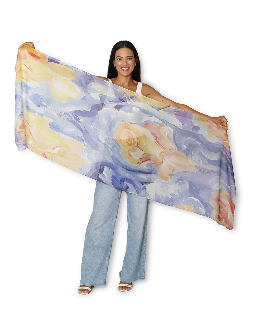 The Artists Label A Sea of Roses scarf featuring a vibrant floral pattern in soft pastel tones, displayed flat.