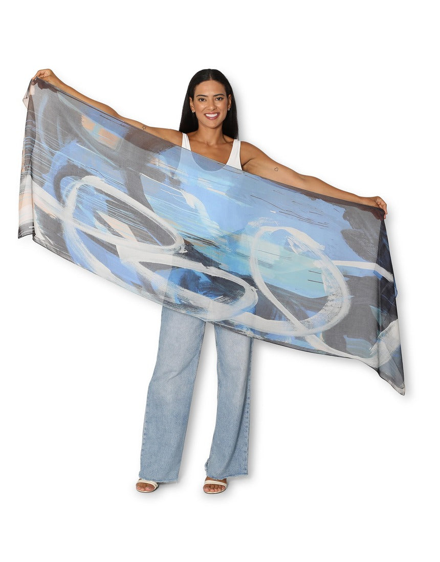 The Artists Label Blues and Roots Scarf featuring vibrant blue and earthy patterns, displayed flat on a neutral background.