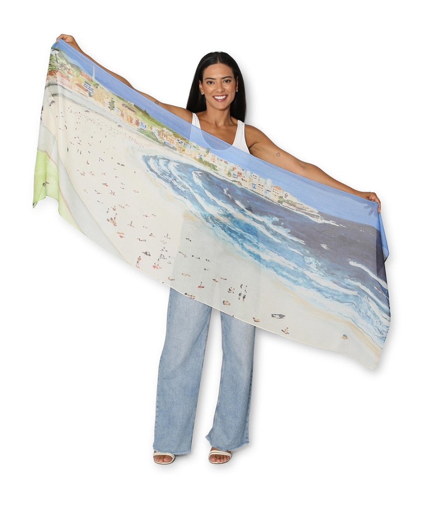 The Artists Label Bondi Scarf featuring vibrant floral and abstract patterns in soft, flowing fabric.