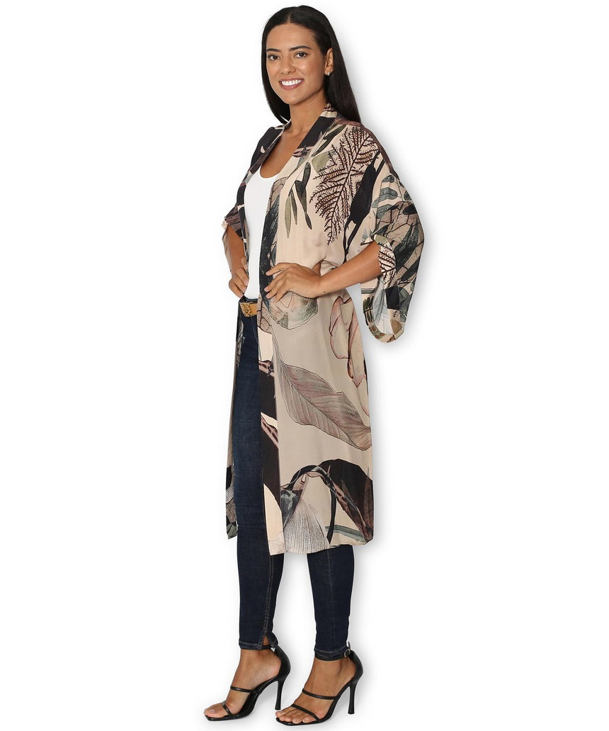 Side view of The Artists Label Radio Garden long silk kimono with flowing fabric and intricate design details.