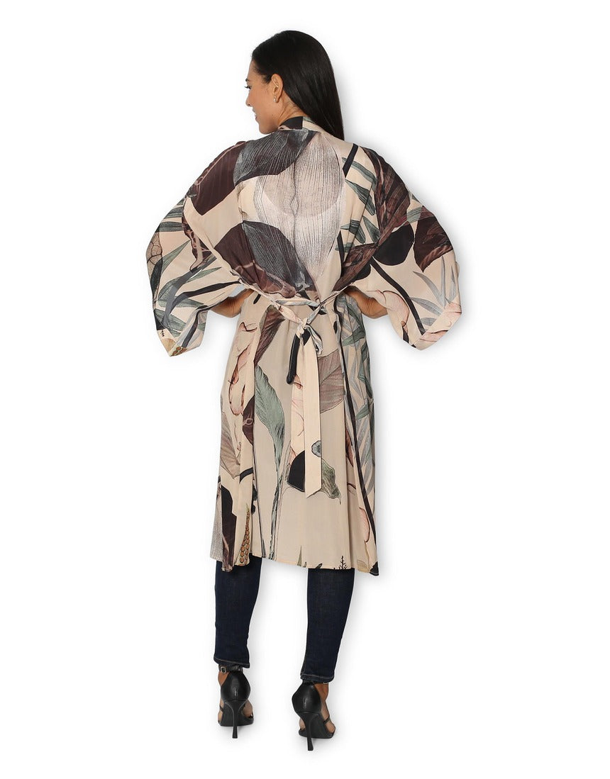 Back view of The Artists Label Radio Garden long silk kimono with flowing fabric and intricate design details.