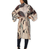 Back view of The Artists Label Radio Garden long silk kimono with flowing fabric and intricate design details.