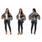 Silk kimono from The Artists Label with celestial wave pattern, flowing fabric, and elegant design for stylish wear.