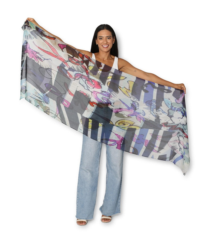 The Artists Label The Sea Scarf featuring a vibrant ocean-inspired design, lightweight fabric, and versatile styling options.