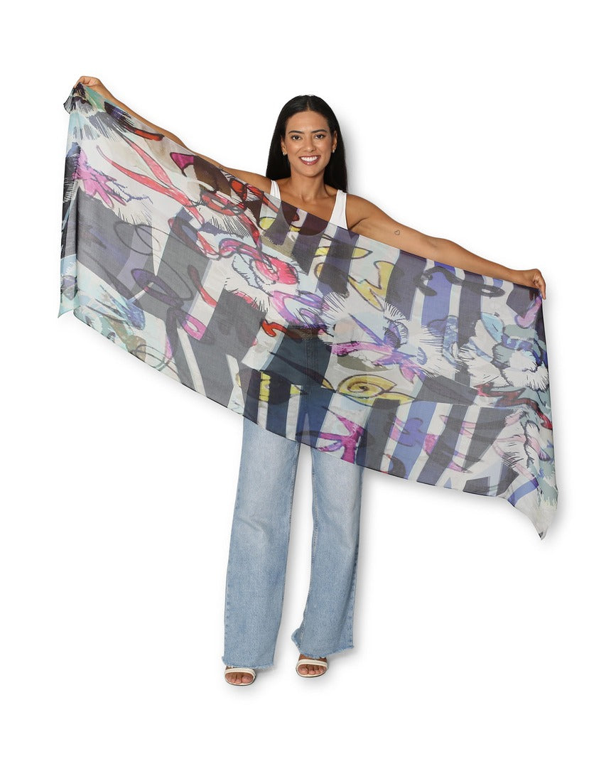 The Artists Label The Sea Scarf featuring a vibrant ocean-inspired design, lightweight fabric, and versatile styling options.