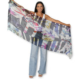 The Artists Label The Sea Scarf featuring a vibrant ocean-inspired design, lightweight fabric, and versatile styling options.