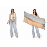 The Artists Label Arrival Viscose Modal Scarf displayed flat, showcasing its soft, lightweight fabric and subtle pattern.