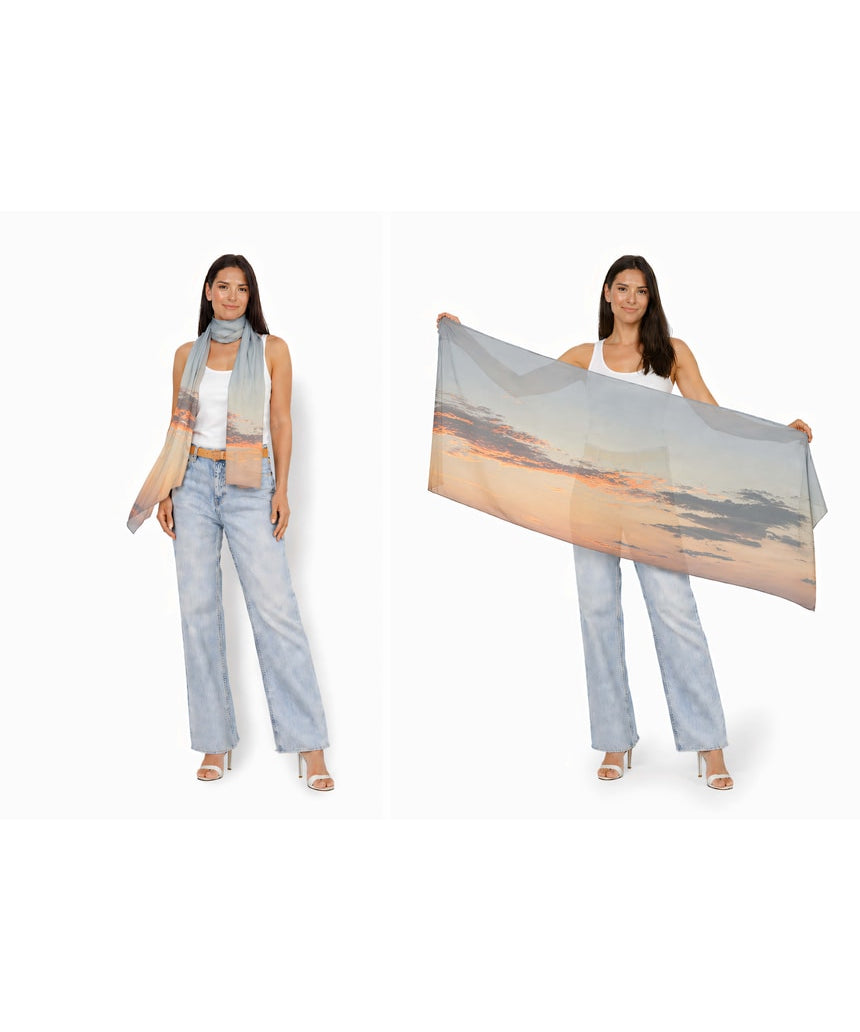 The Artists Label Arrival Viscose Modal Scarf featuring soft, lightweight fabric with a stylish, abstract pattern in neutral tones.
